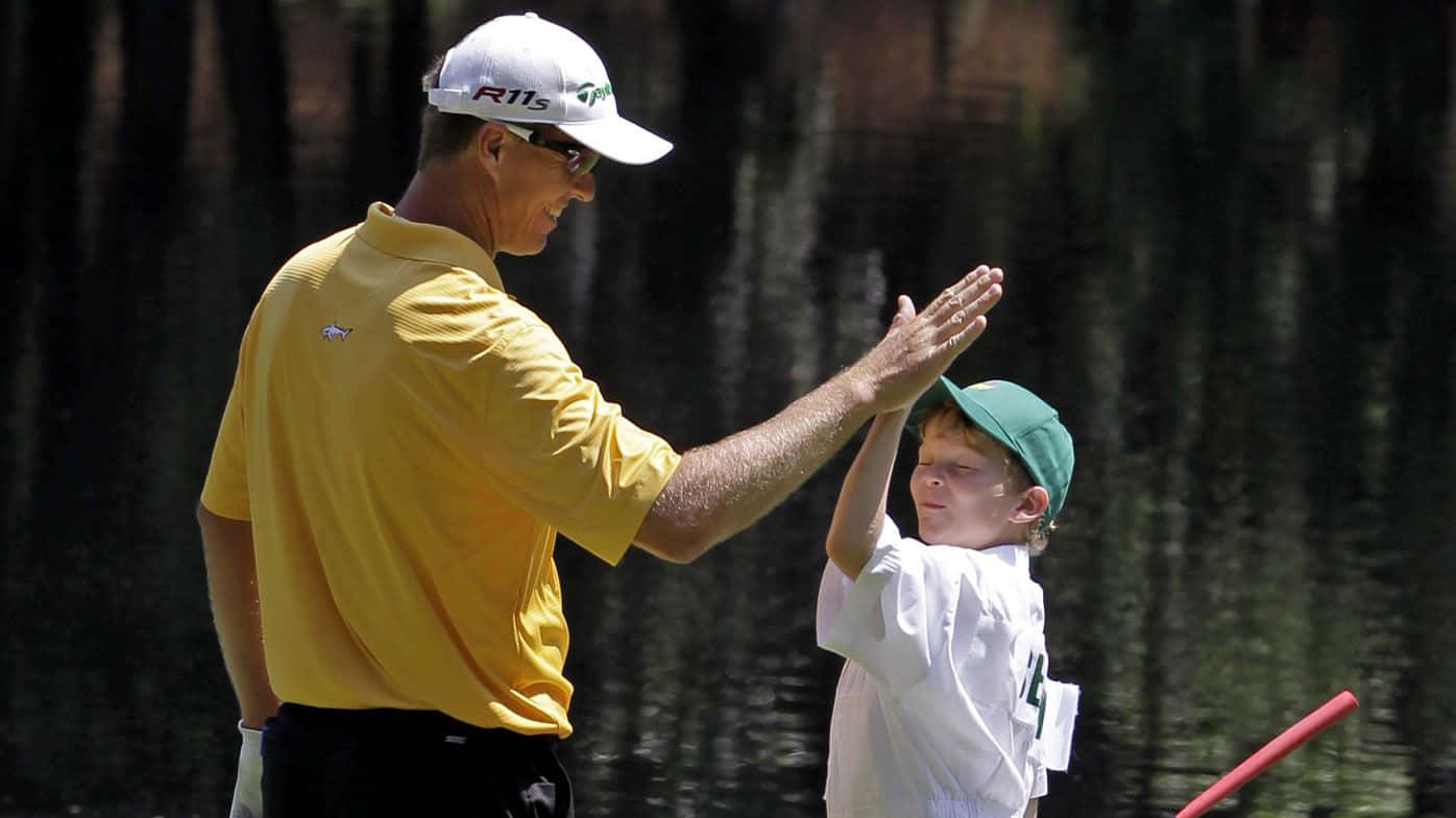 John Senden High-five With Son Wallpaper