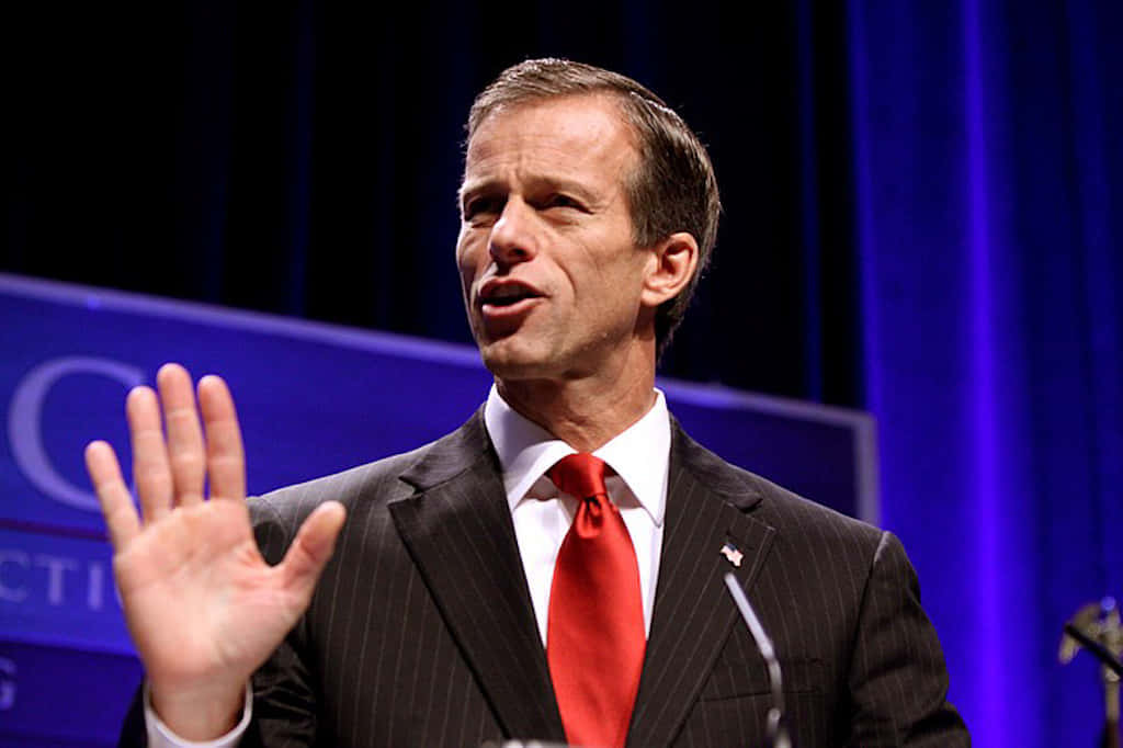 John Thune With Partially Raised Hand Wallpaper