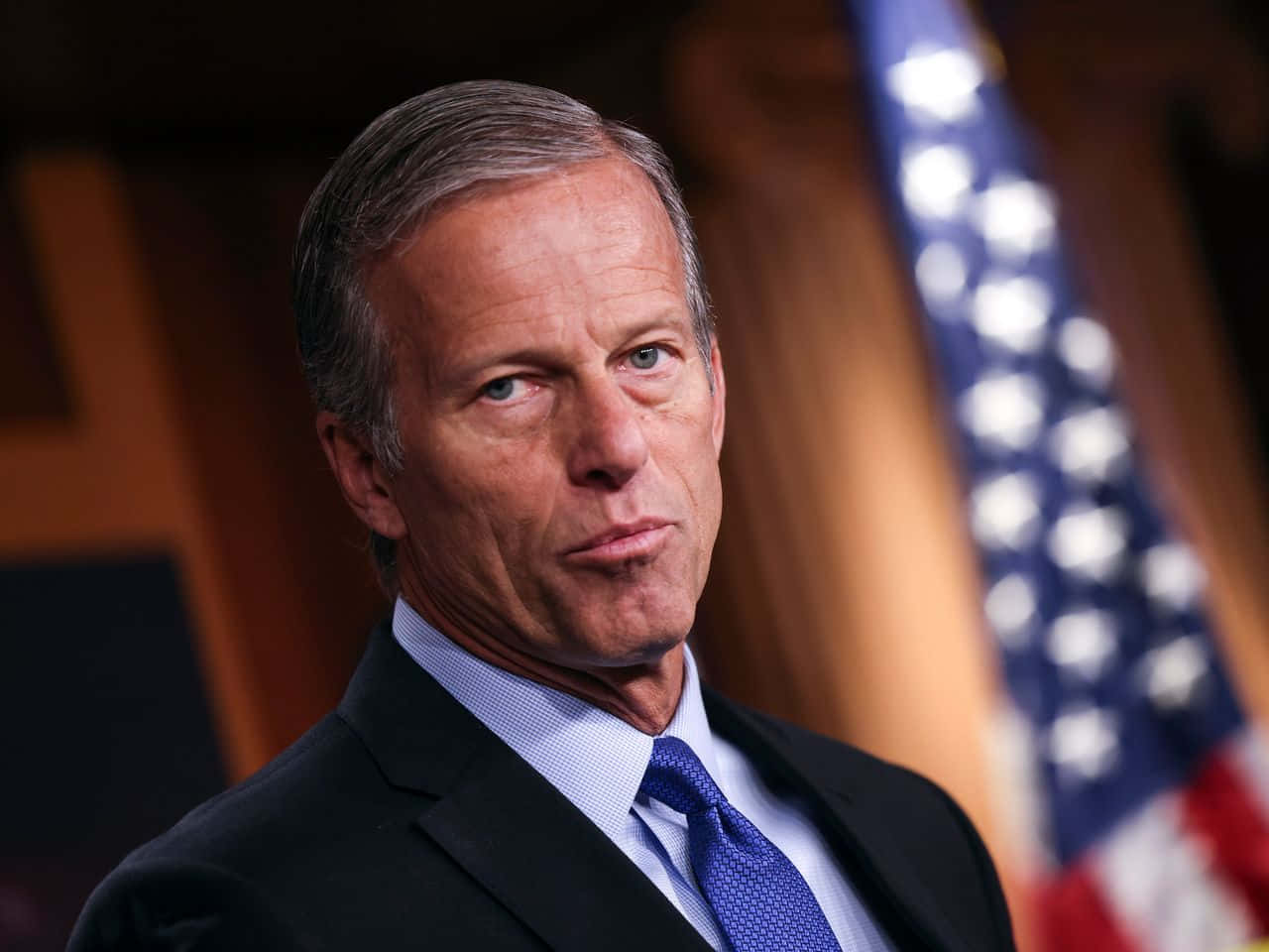 John Thune With Serious Facial Expression Wallpaper