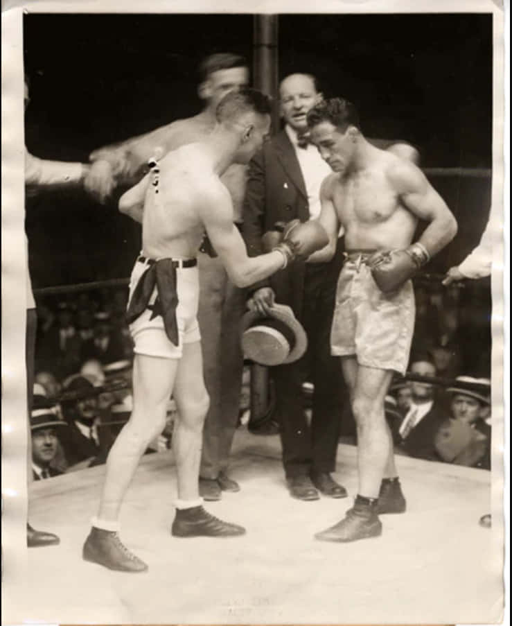 Johnny Dundee And Eugene Criqui's Fist Bump Before The Fight Wallpaper