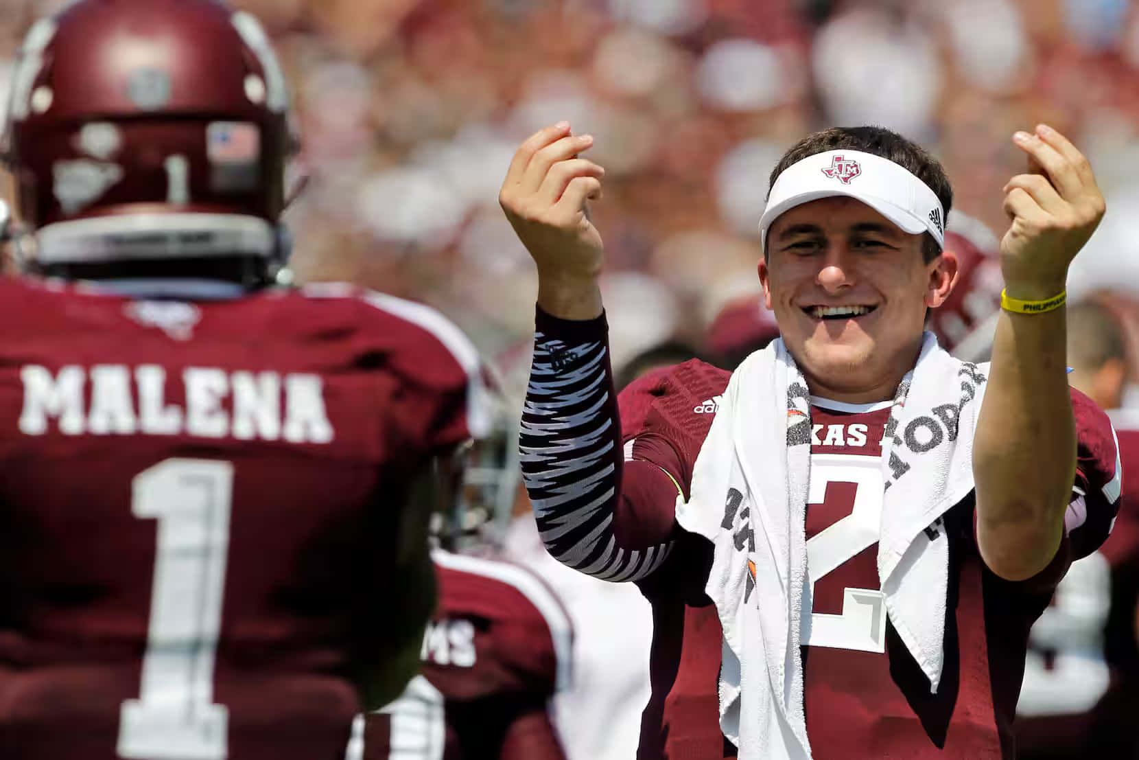 Johnny Manziel Celebratingon Field Wallpaper