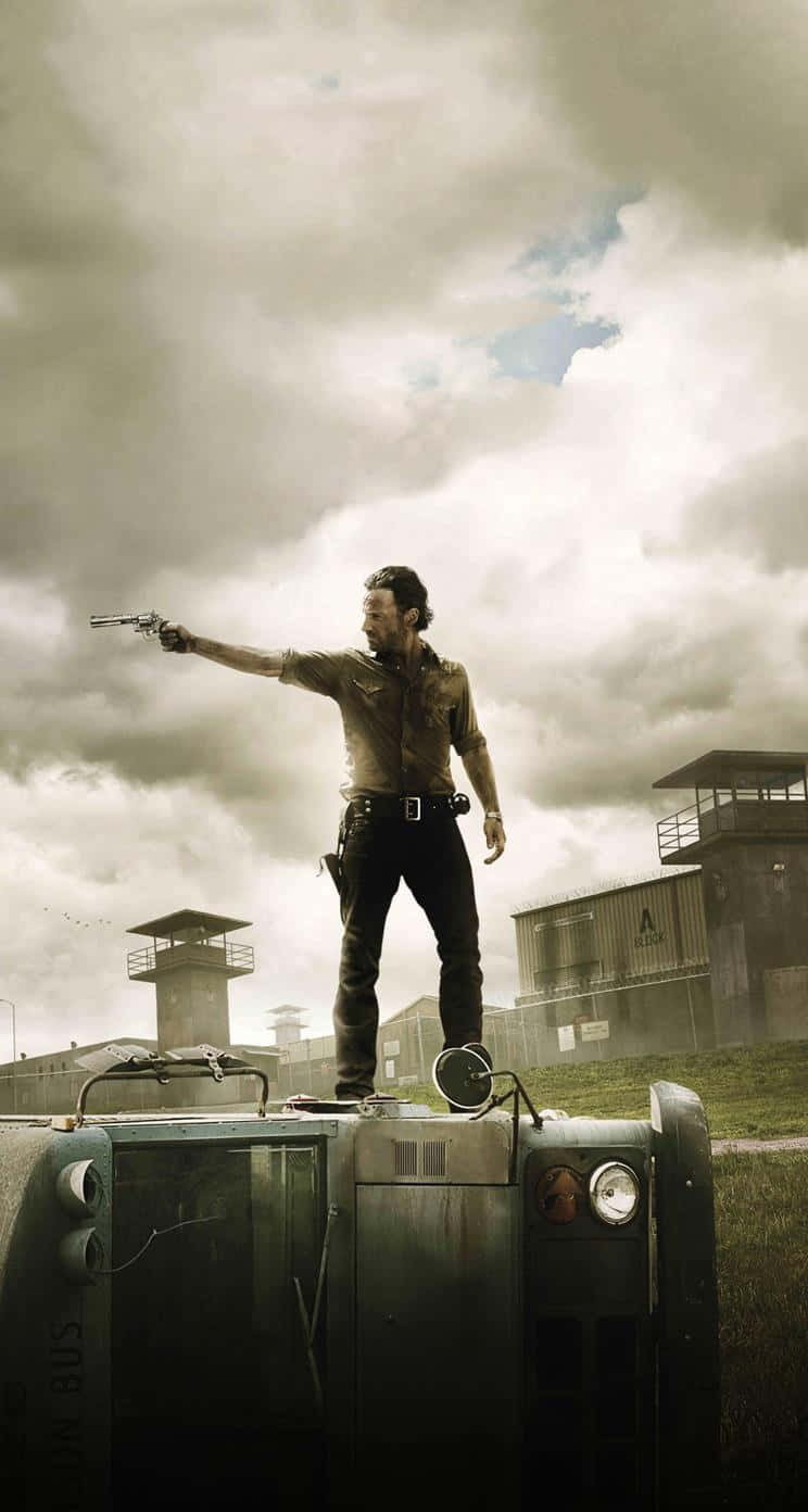 Join The Battle To Survive In The Walking Dead With This Iphone Wallpaper Wallpaper