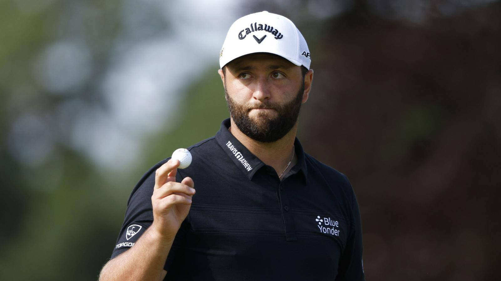 Jon Rahm Holding A Golf Ball Wallpaper