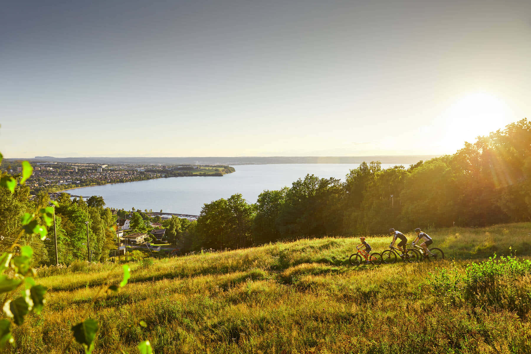 Jonkoping Sunset Biking Overlooking Lake Vattern Wallpaper