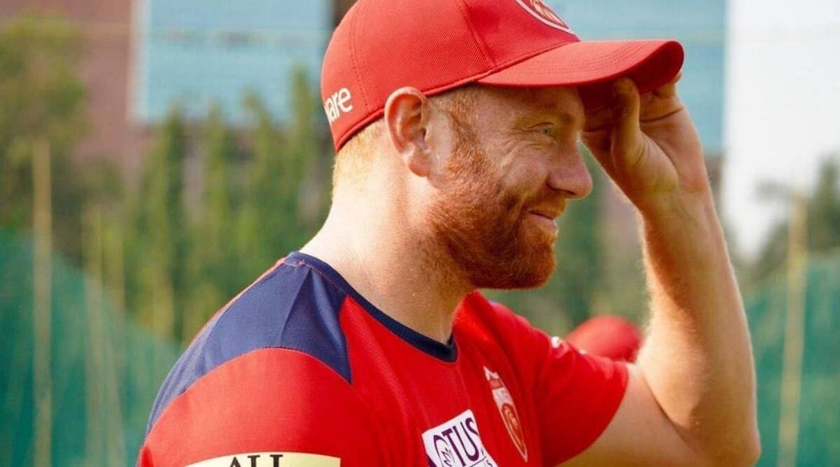 Jonny Bairstow Side Profile In Red Cap Wallpaper