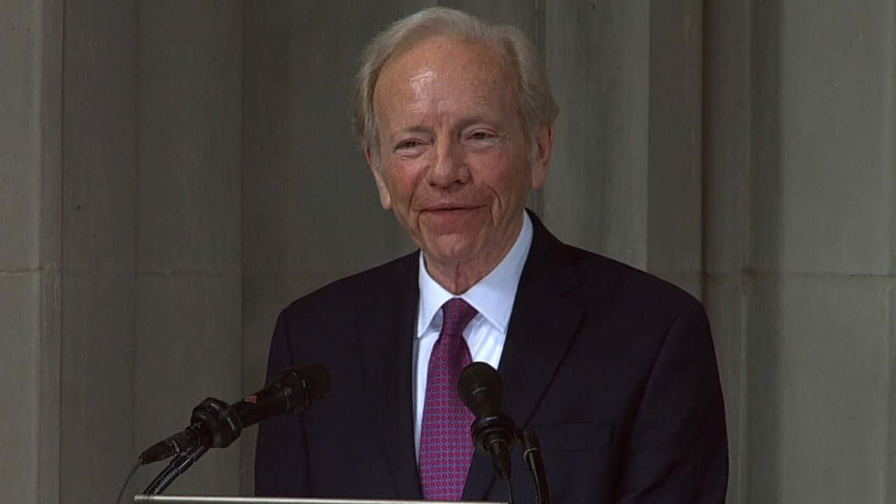 Joseph Lieberman Speakingat Podium Wallpaper