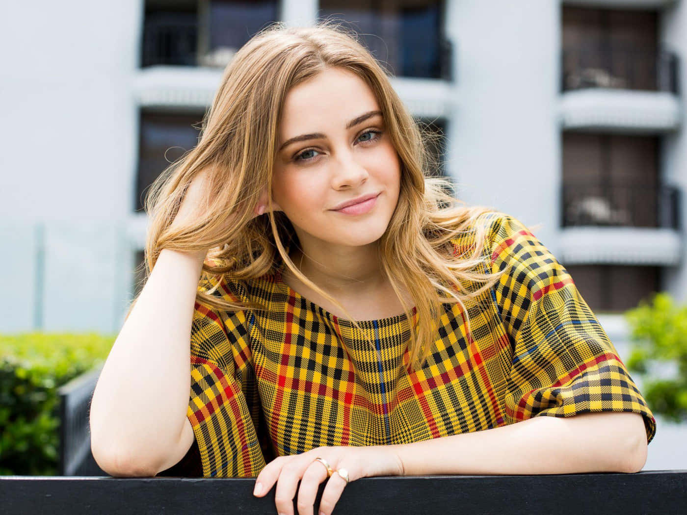 Josephine Langford Smilingin Plaid Top Wallpaper