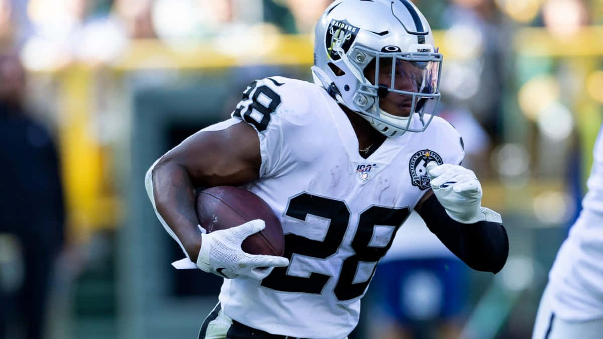 Josh Jacobs Raiders Running Back Action Wallpaper