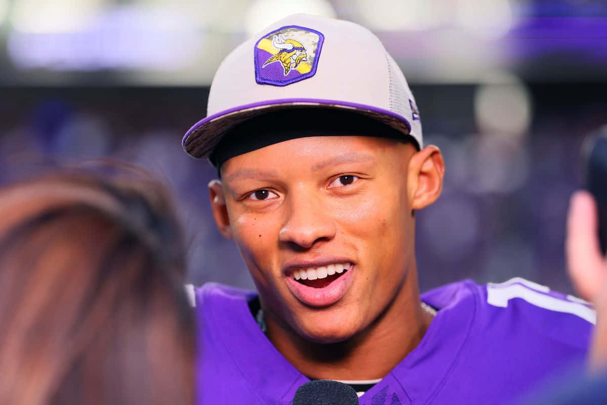 Joshua Dobbs Speaking Interview Vikings Cap Wallpaper