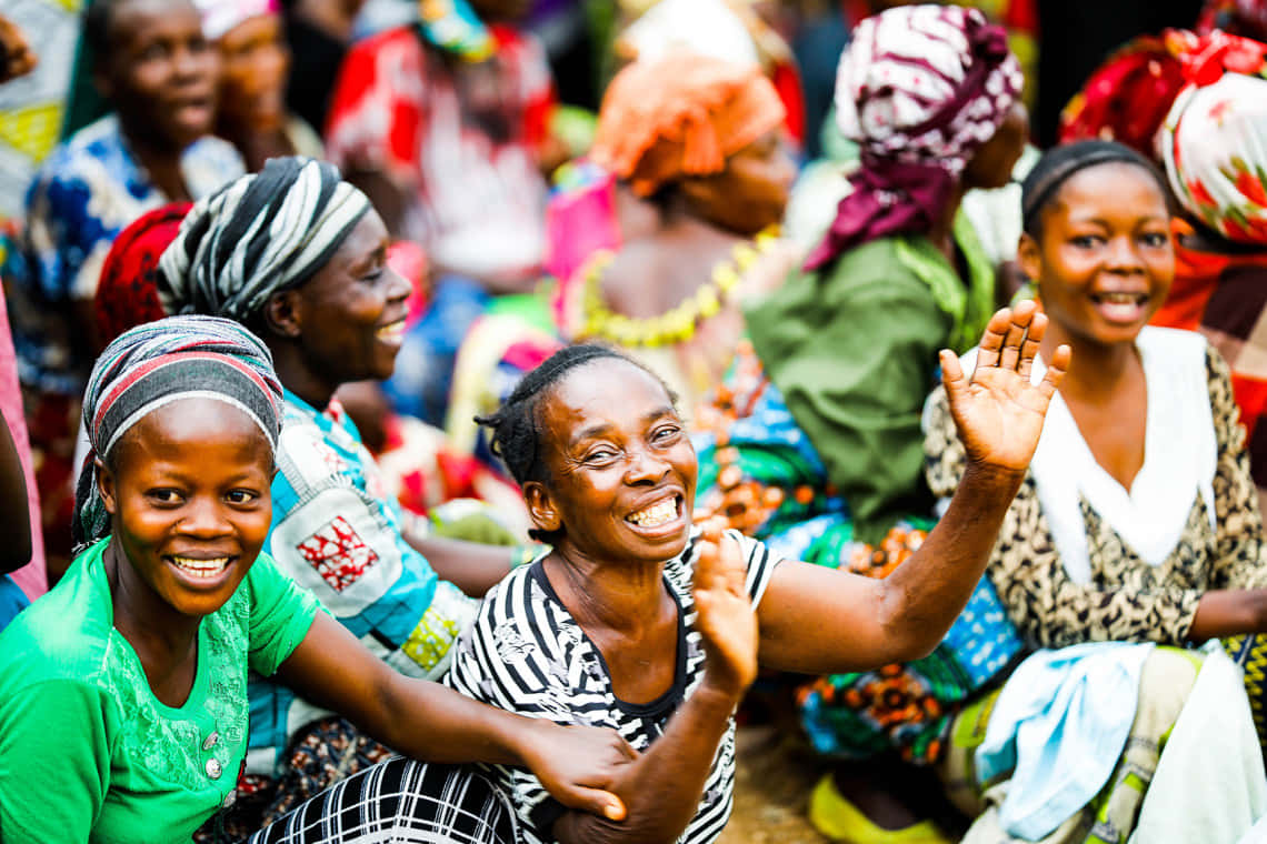 Joyful Congolese Women Greeting Wallpaper