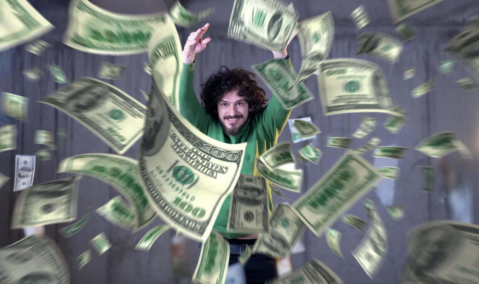 Joyful Man Celebrating Money Rain Wallpaper