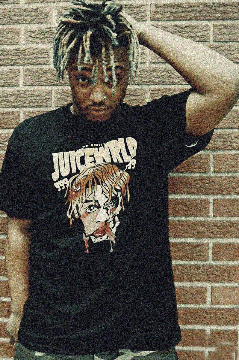 Juice Wrld 999 In Brick Wall Wallpaper