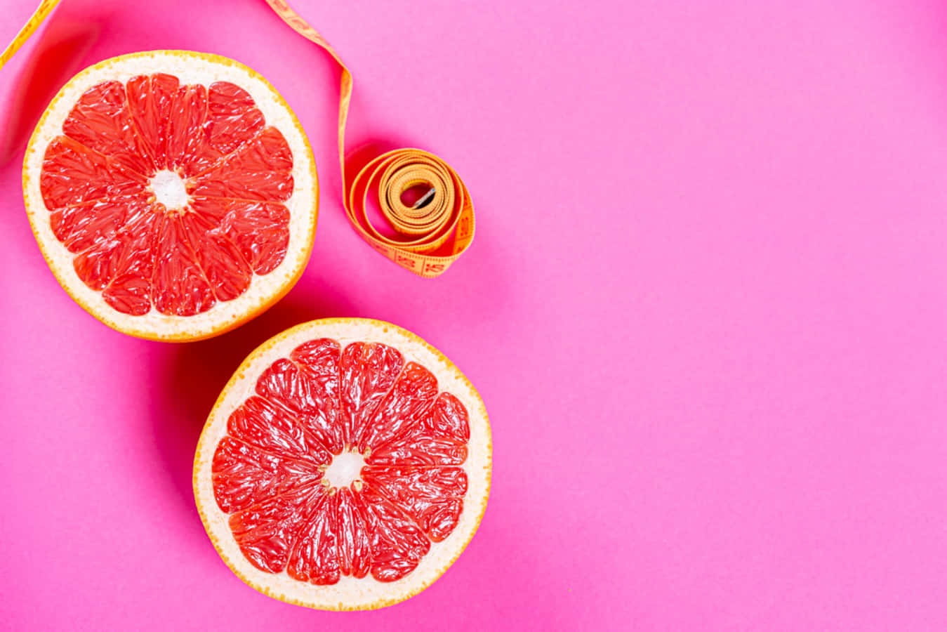 Juicy Pink Grapefruit Slices Wallpaper