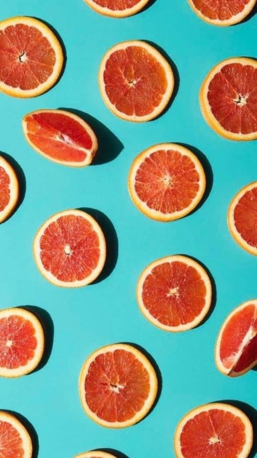 Juicy Pink Grapefruit Slices Wallpaper