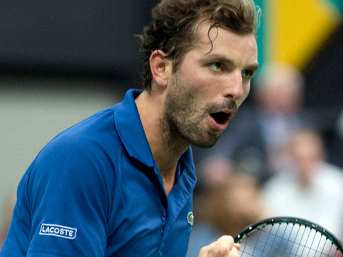 Julien Benneteau Engages In Intense Match Wallpaper