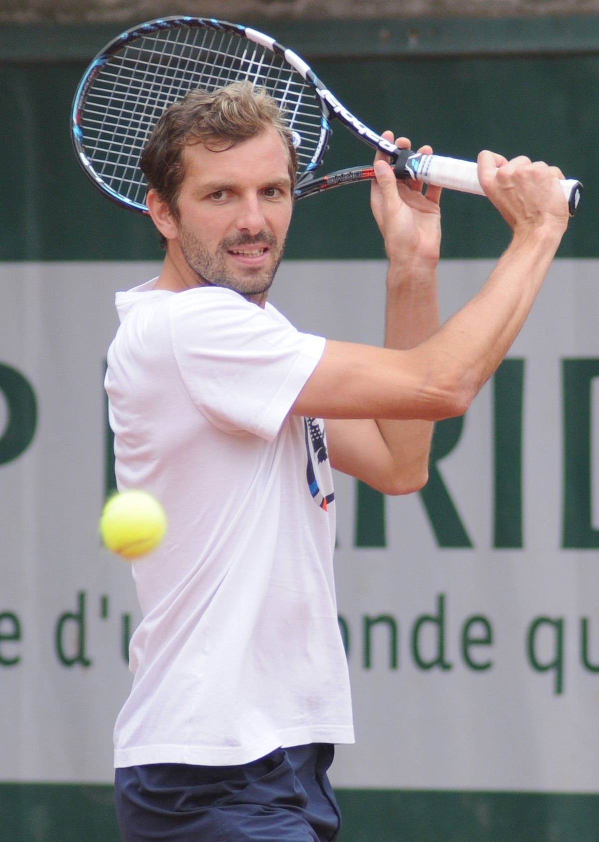 Julien Benneteau With Two-handed Backhand Stroke Wallpaper