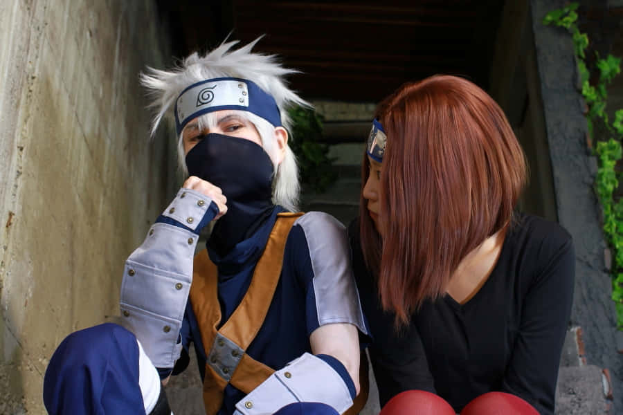 Kakashi And Rin, A Memorable Moment From The Hidden Leaf Village Wallpaper