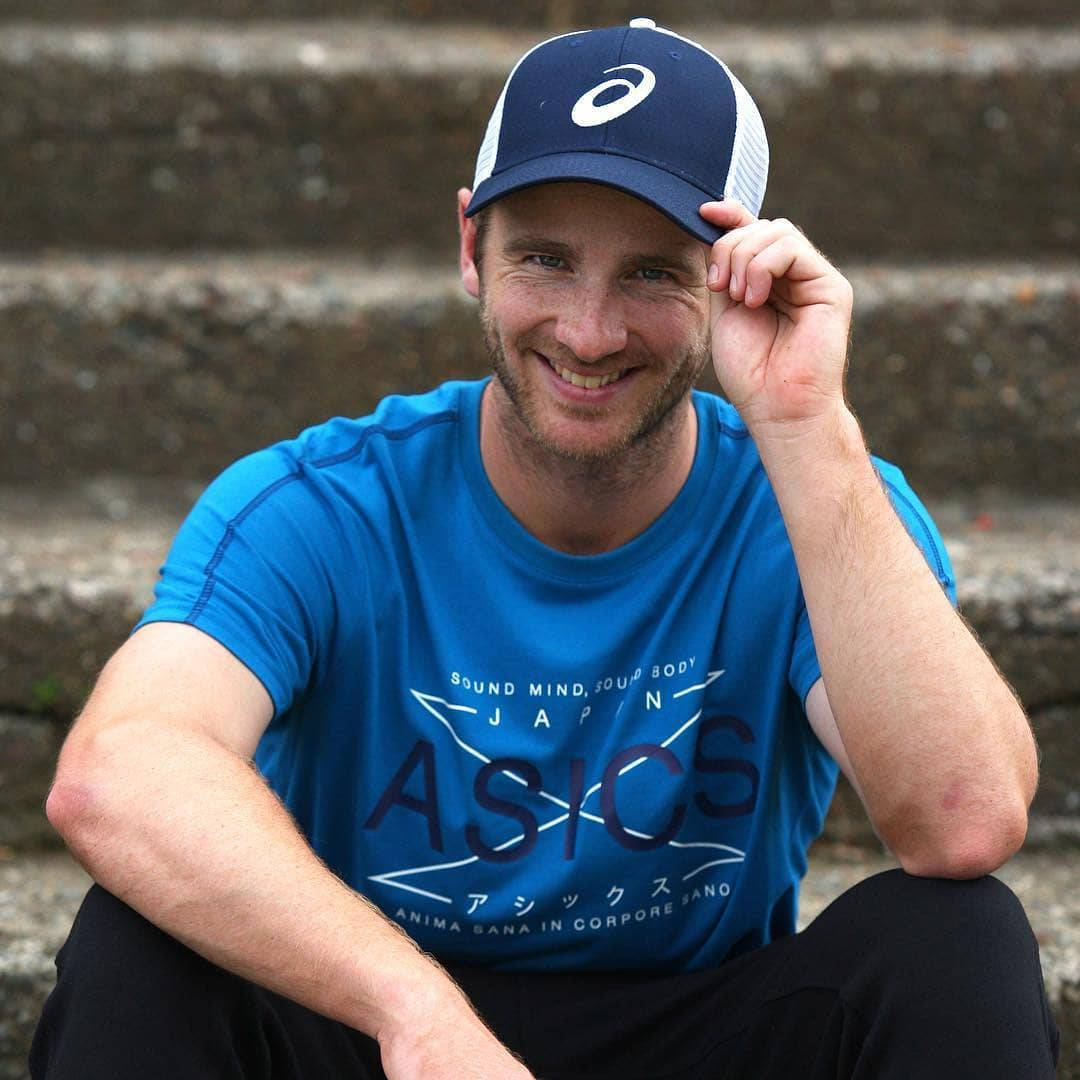 Kane Williamson Blue Shirt And Cap Wallpaper