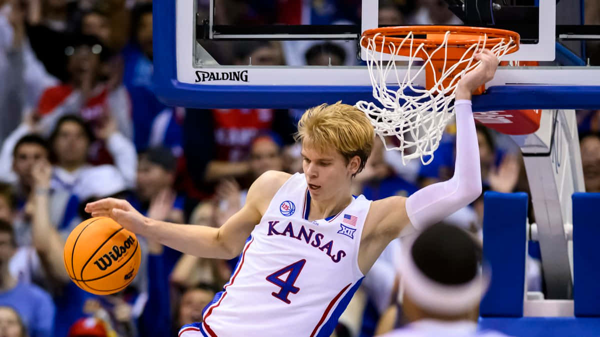 Kansas Basketball Player Dunking Wallpaper