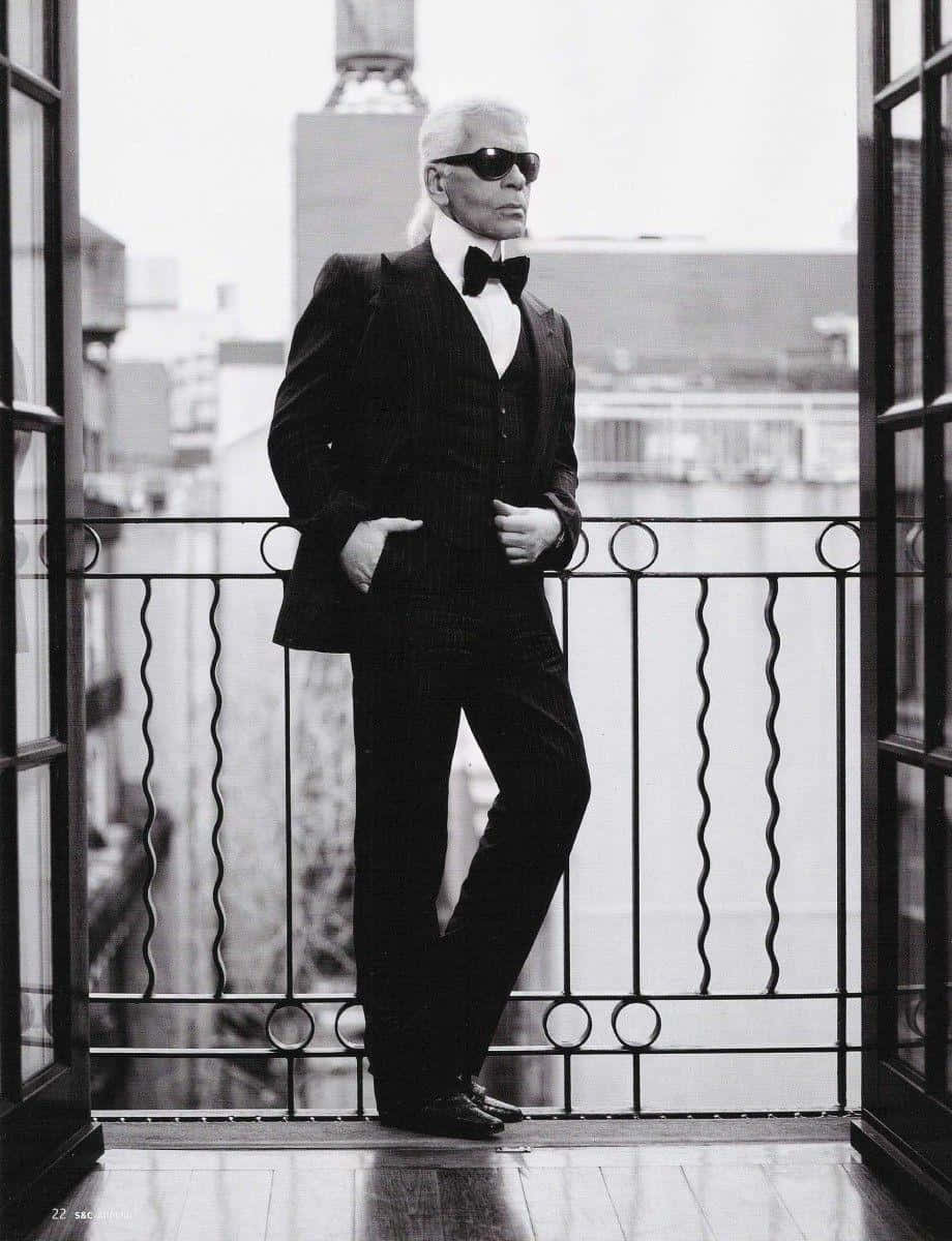 Karl Lagerfeld, Iconic Designer In Fashion's History Wallpaper