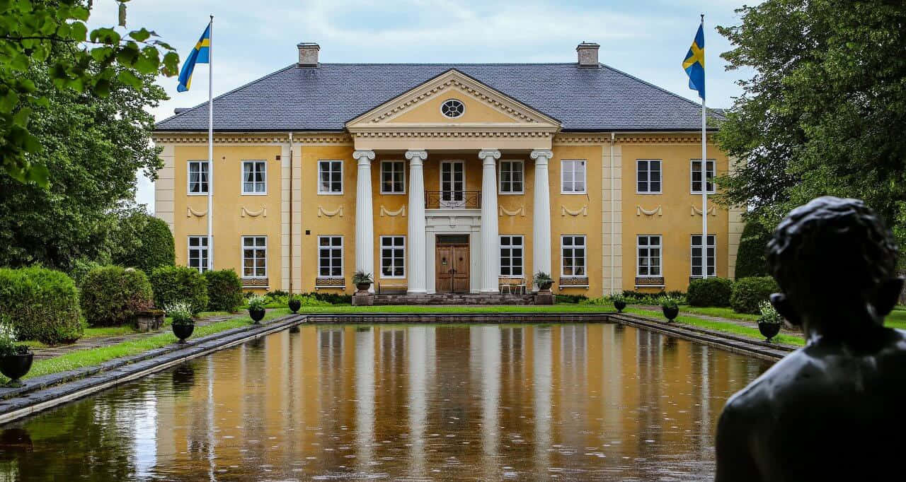 Karlstad Sweden Historical Buildingand Reflective Pond Wallpaper