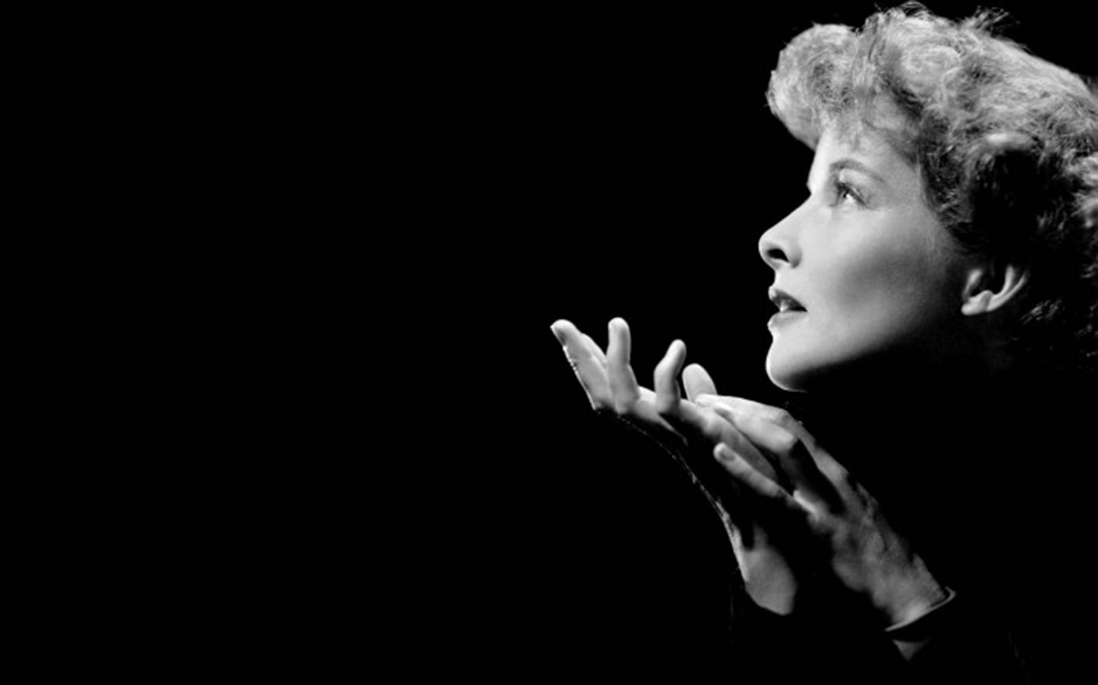 Katharine Hepburn On A Solid Black Background Wallpaper