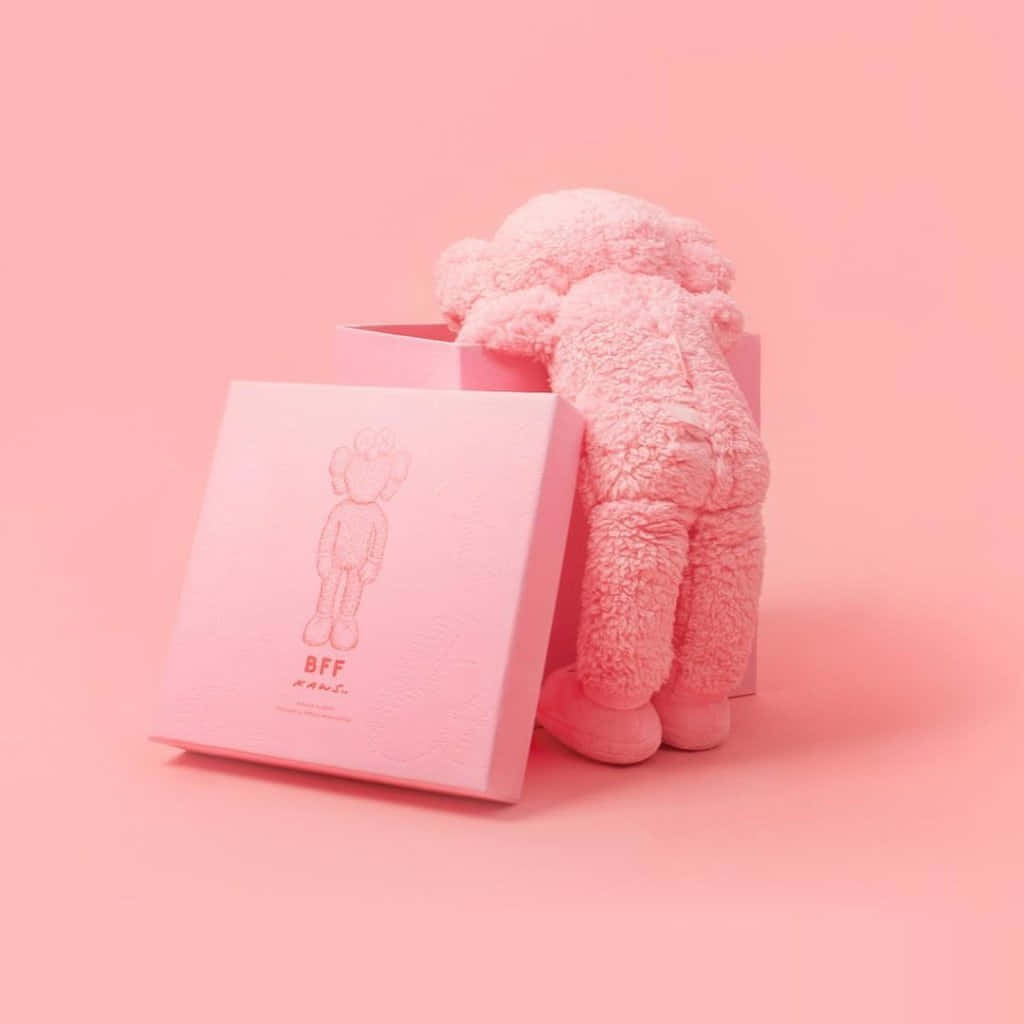 Kaws B F F Pink Figureand Packaging Wallpaper