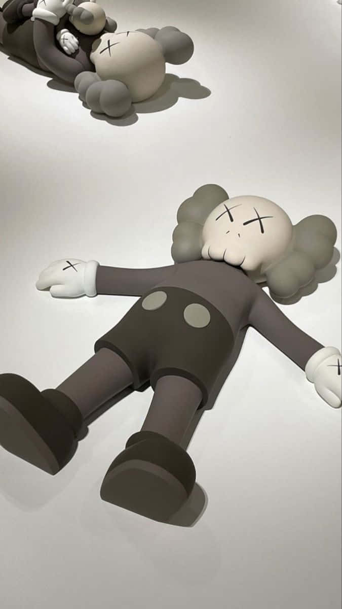 Kaws Companion Figures Lying Down Wallpaper