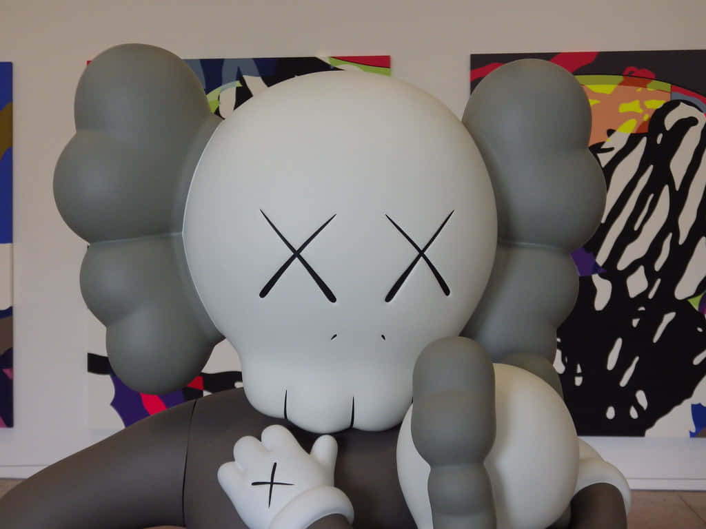 Kaws Companion Sculpture Art Exhibit Wallpaper