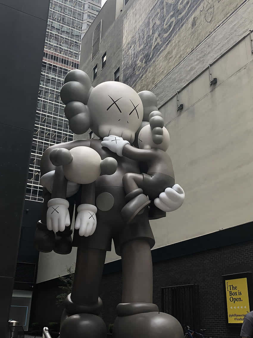 Kaws Companion Sculpture Urban Backdrop Wallpaper