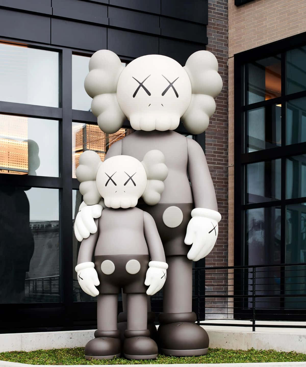 Kaws Figures Collection In Vibrant Display Wallpaper