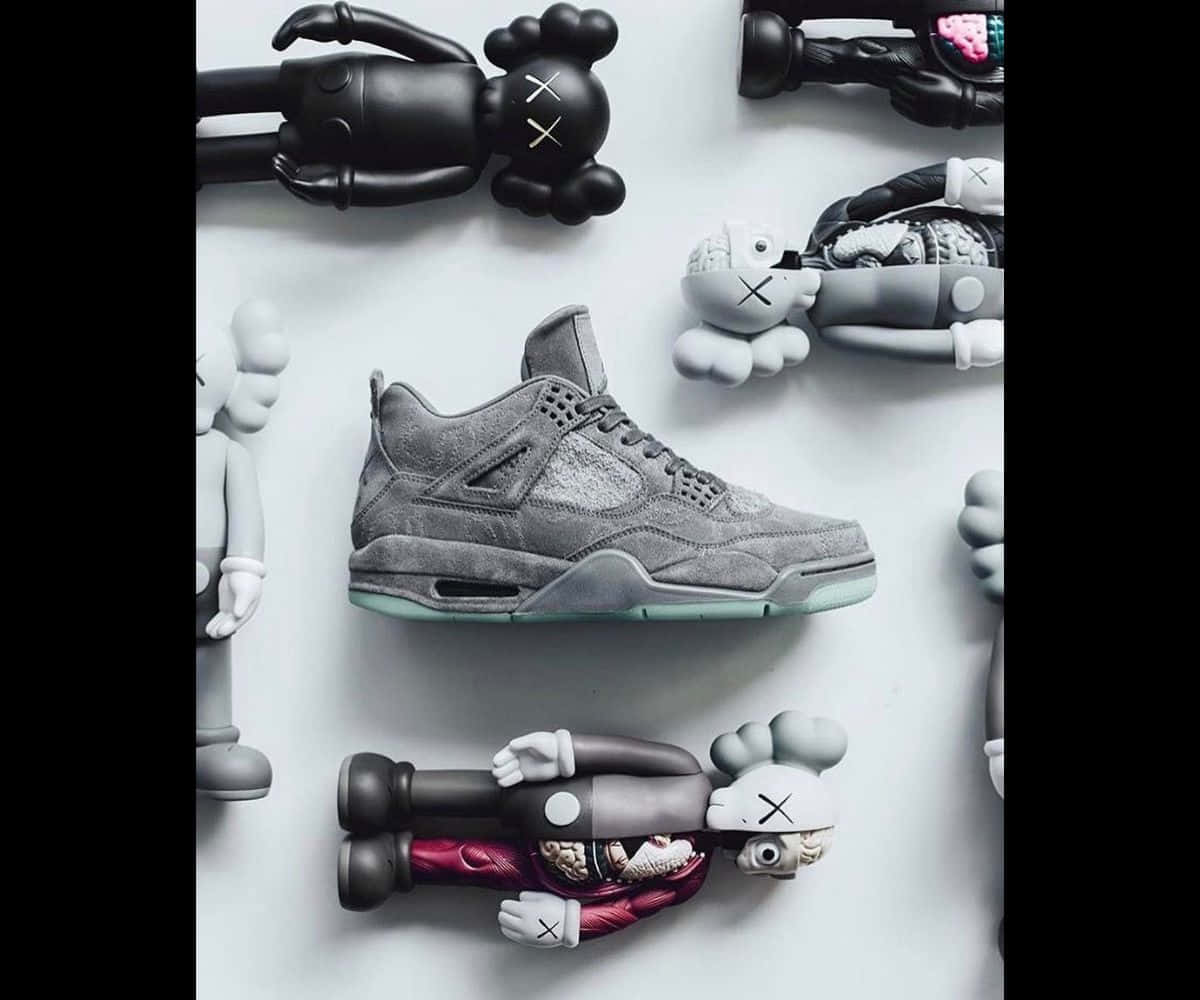 Kaws X Air Jordan - A Unique Collaboration In Sneaker Fashion Wallpaper