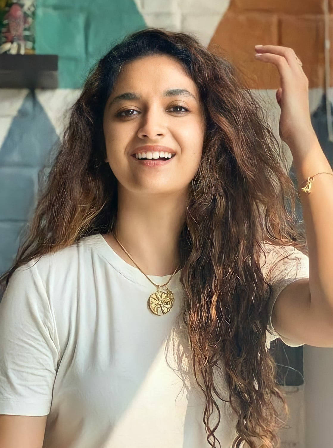 Keerthi Suresh Curly Brown Hair Wallpaper