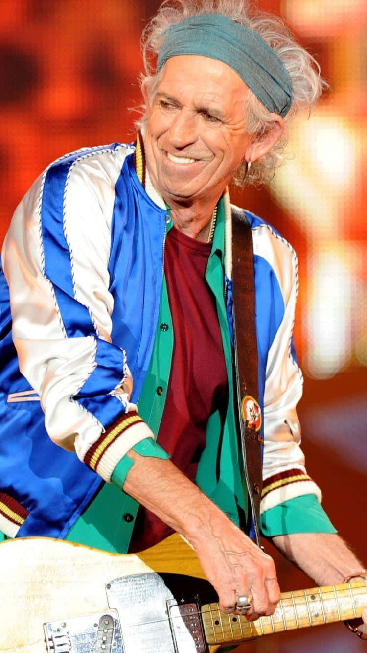 Keith Richards Guitar Performance Wallpaper