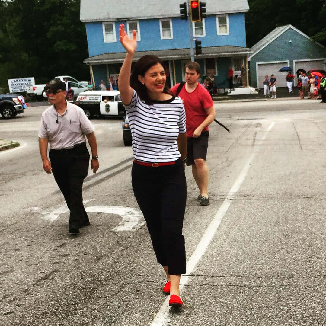 Kelly Ayotte Waving At Someone Wallpaper