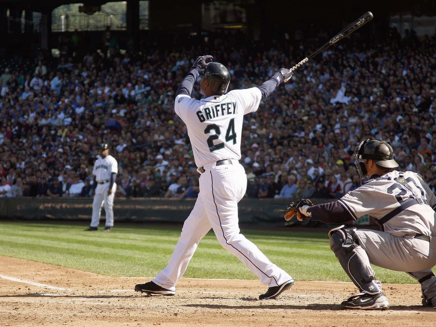 Ken Griffey Takes A Mighty Swing Wallpaper