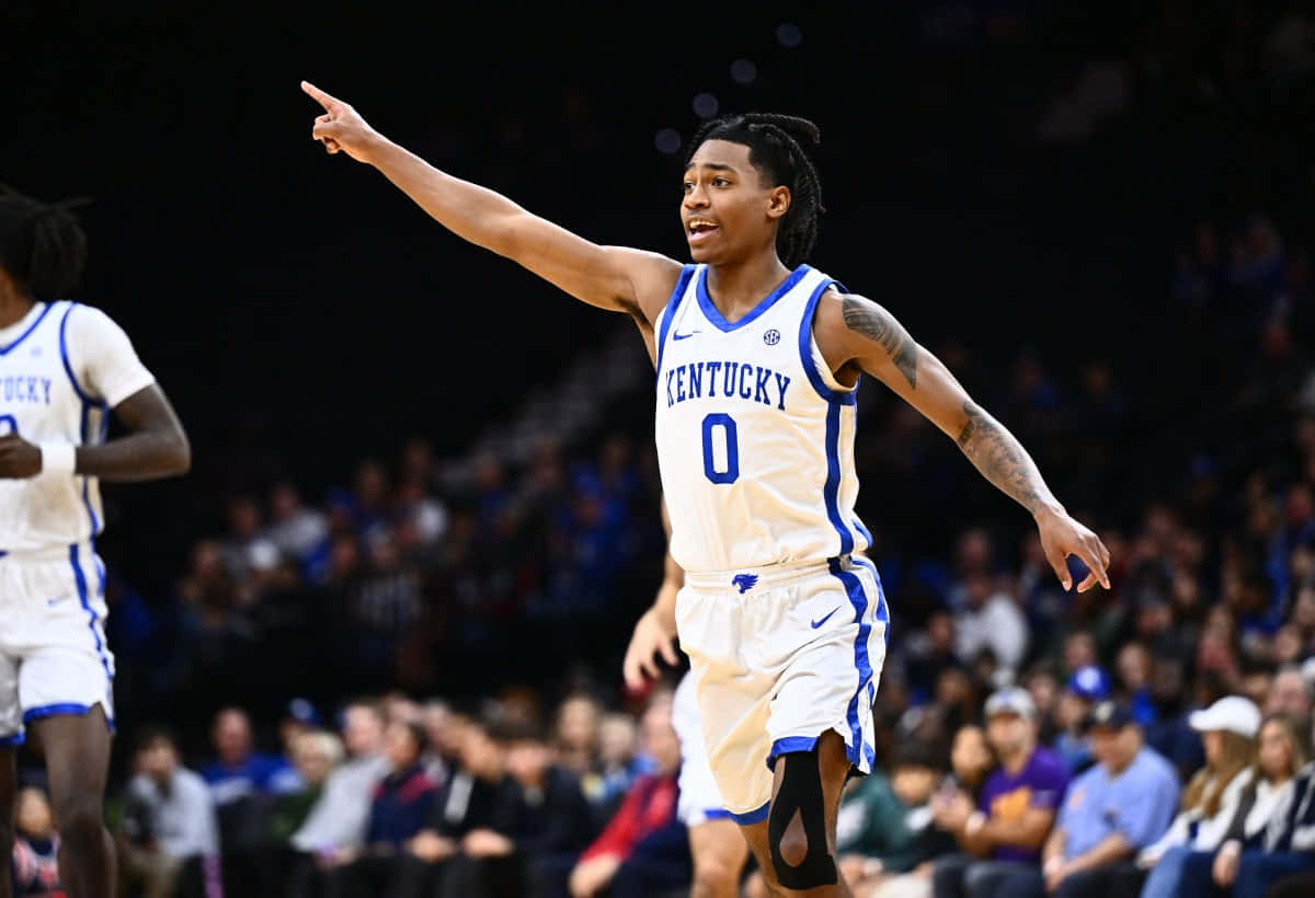 Kentucky Basketball Player Pointing During Game Wallpaper