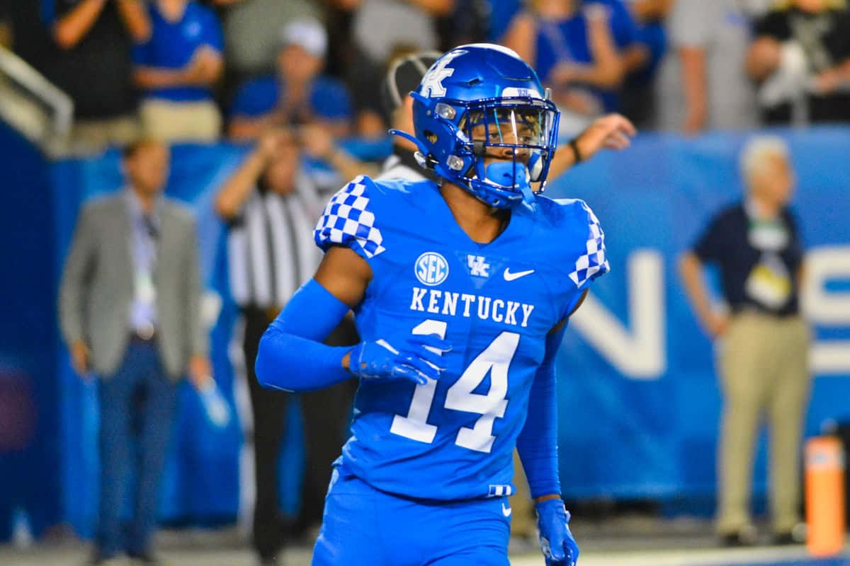 Kentucky Football Player In Action Wallpaper