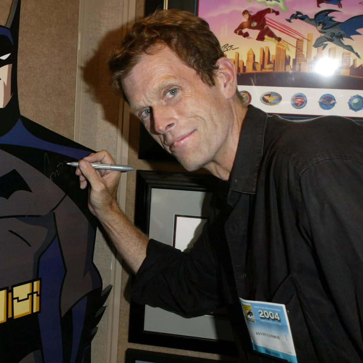 Kevin Conroy Posing For A Portrait Wallpaper