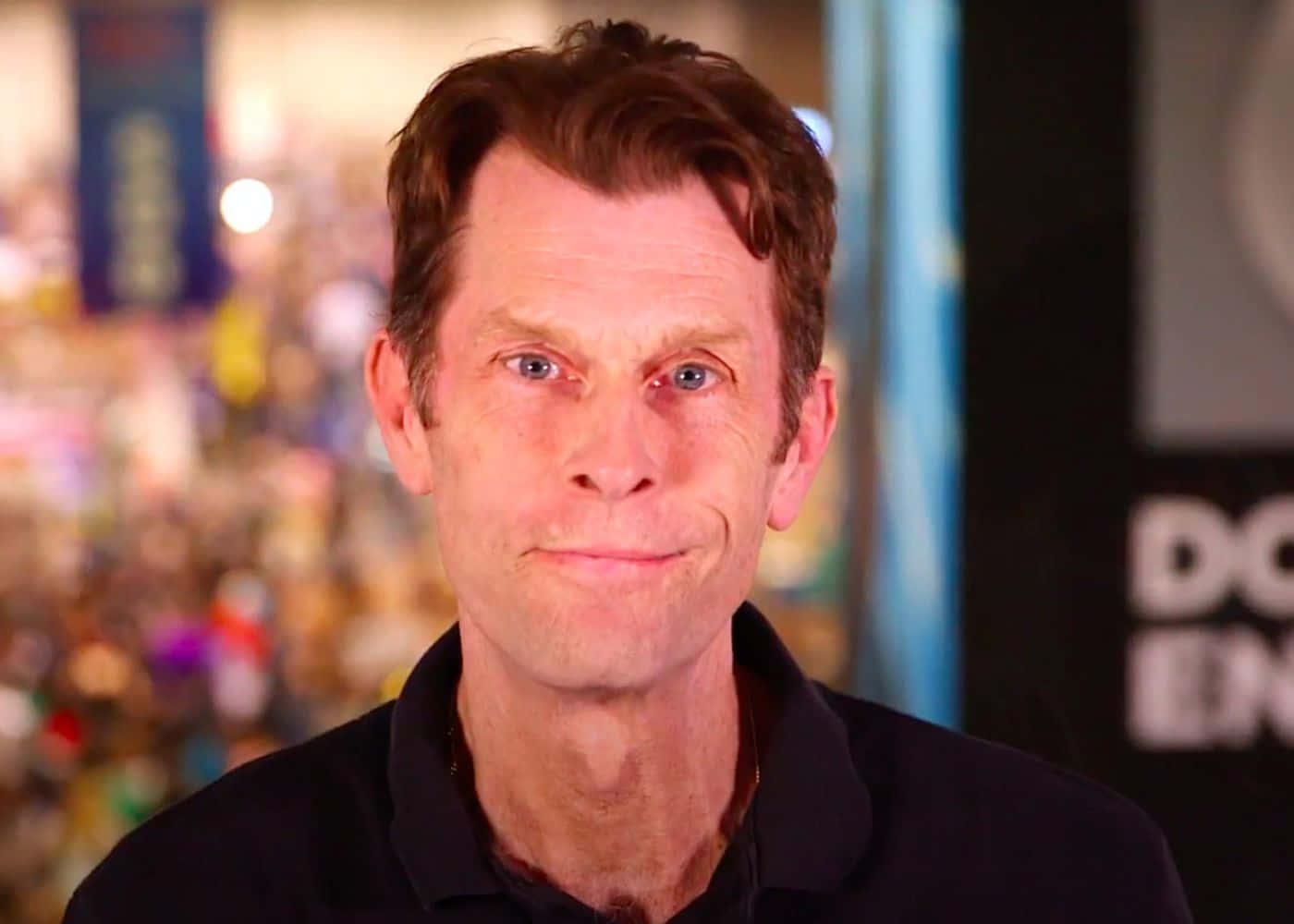 Kevin Conroy Posing In A Portrait Wallpaper