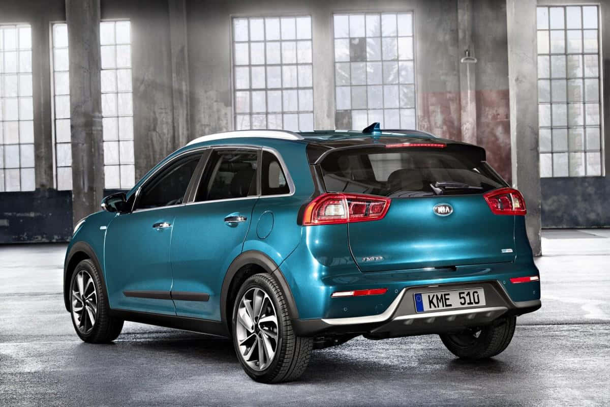 Kia Niro: Discover The Power Of Hybrid Driving Wallpaper