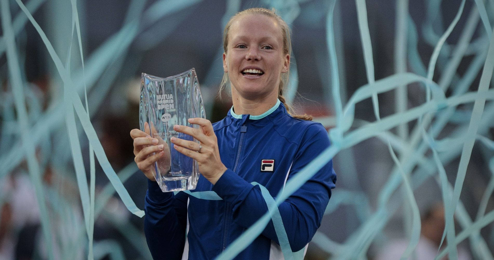 Kiki Bertens Celebrating With Blue Streamers Wallpaper