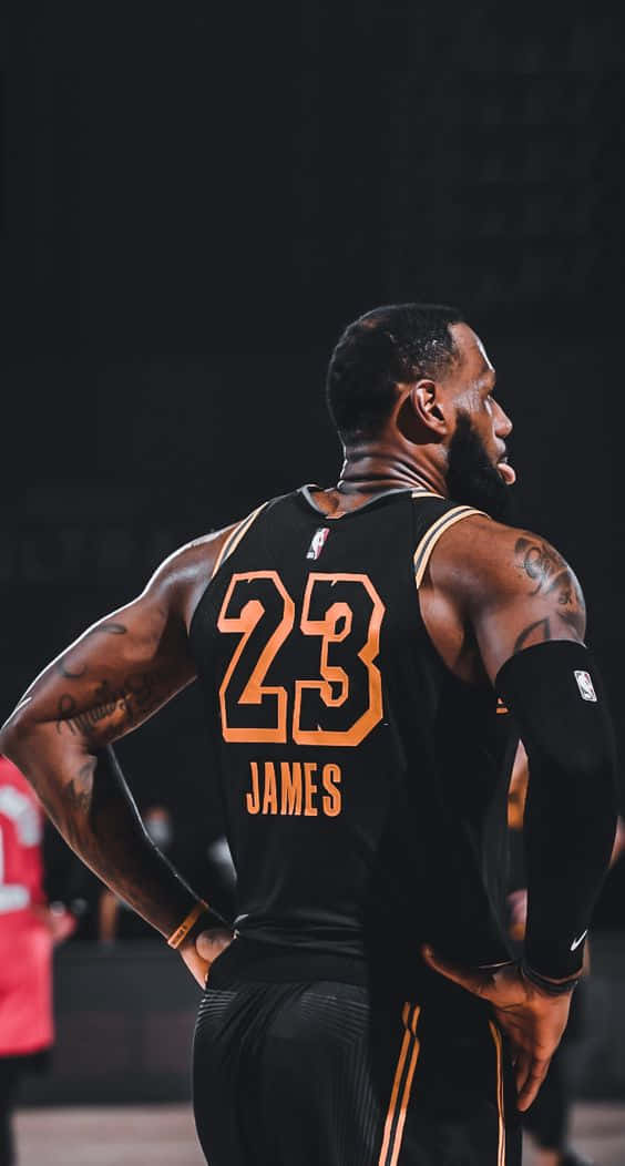 King Lebron James In Black Jersey Wallpaper