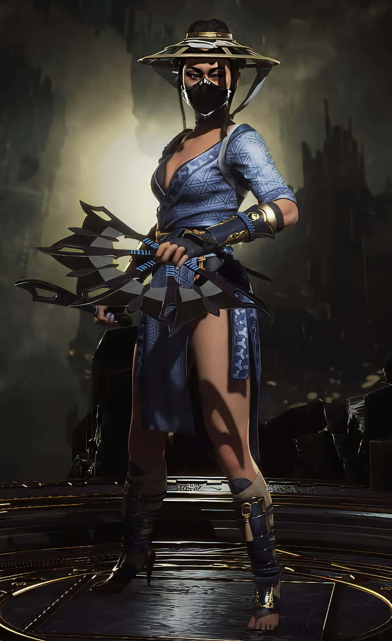 Kitana, The Enchanting Princess Of Edenia, Unleashing Her Deadly Moves Wallpaper