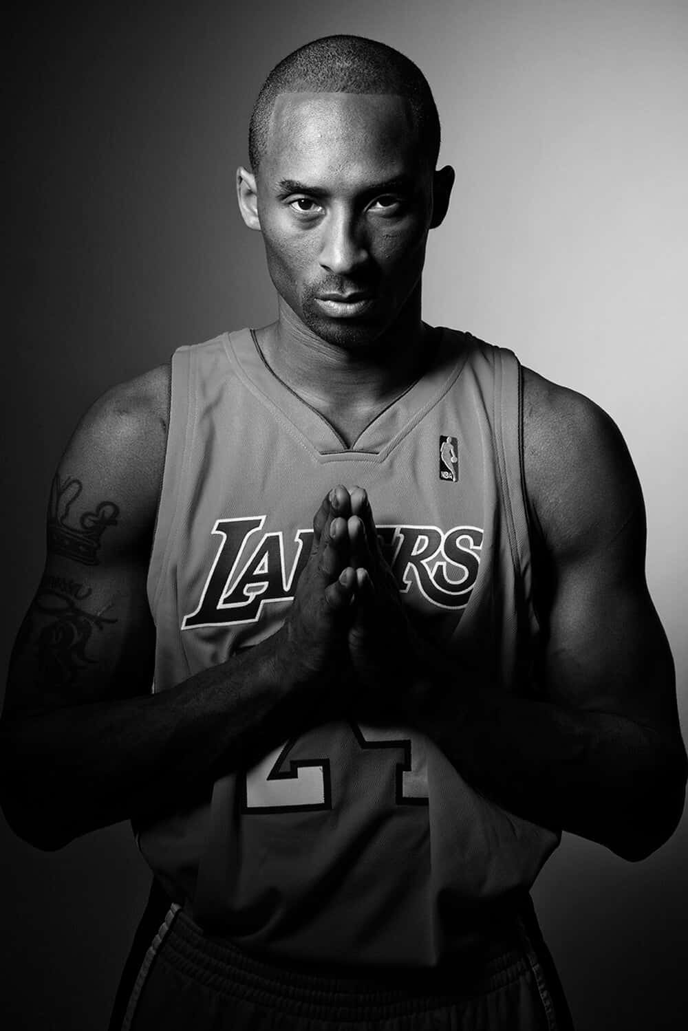 Kobe Bryant Intense Blackand White Portrait Wallpaper