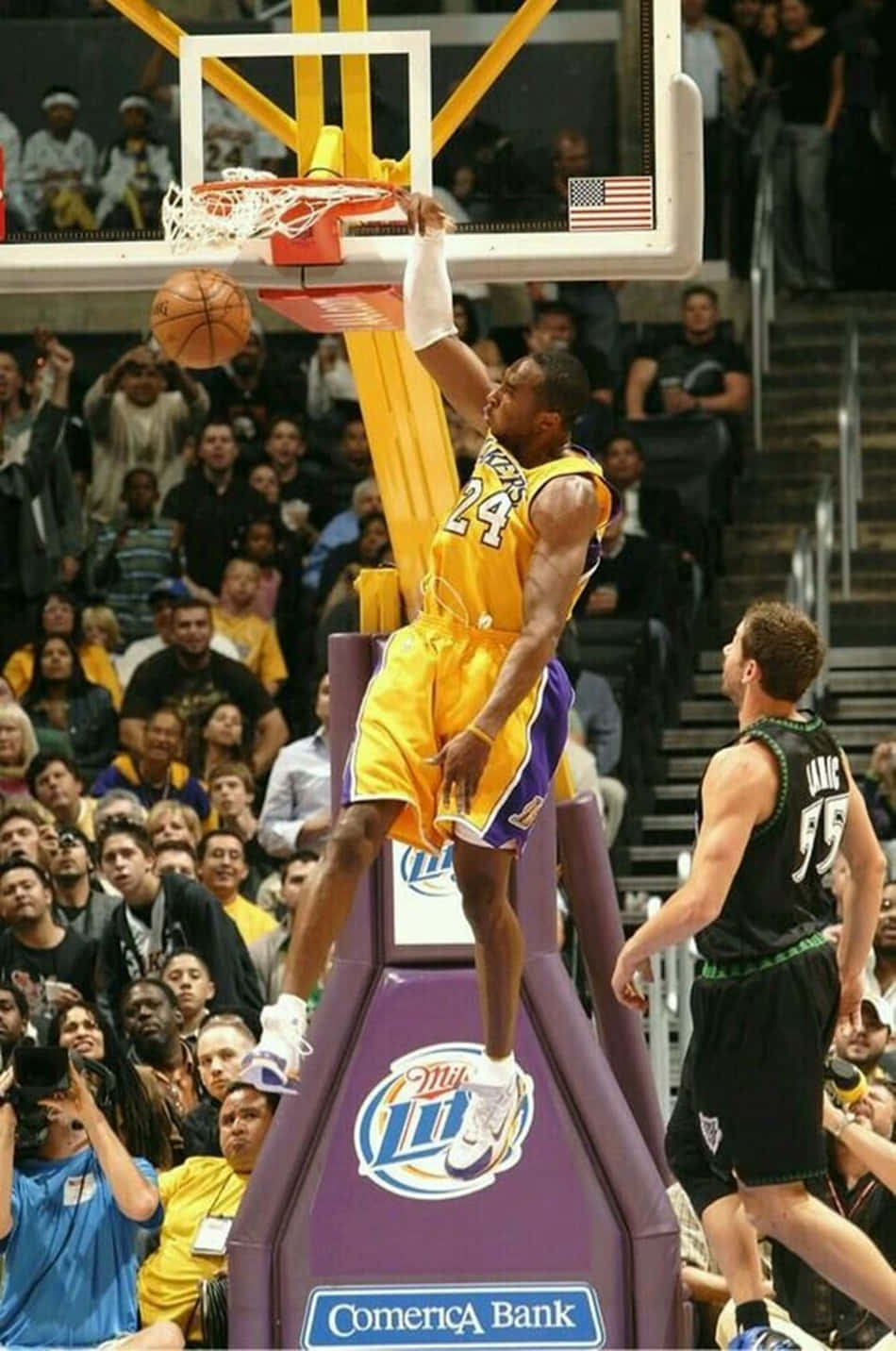 Kobe Bryant Performing An Iconic Dunk Wallpaper