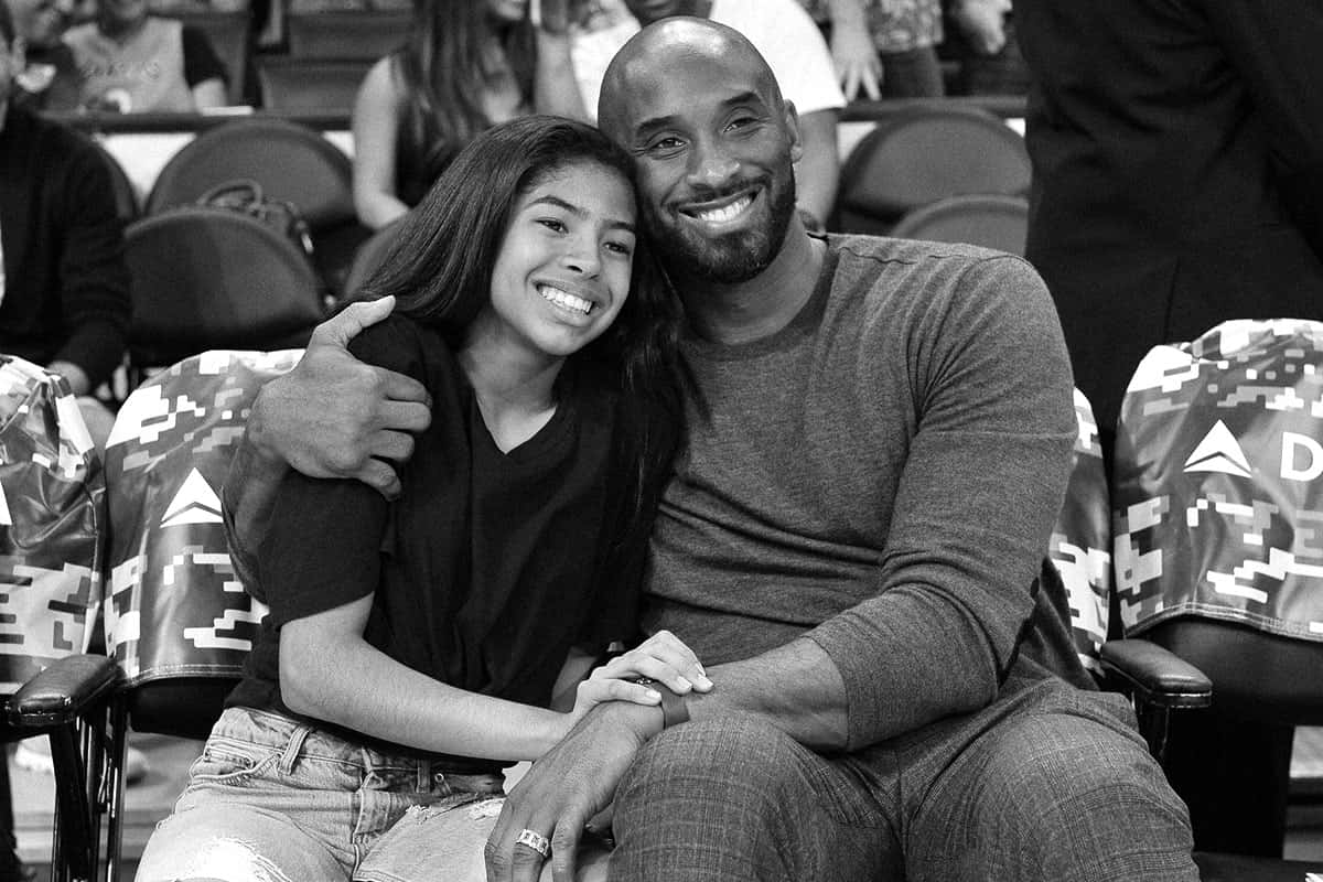 Kobe Bryantand Daughter Court Side Moment Wallpaper