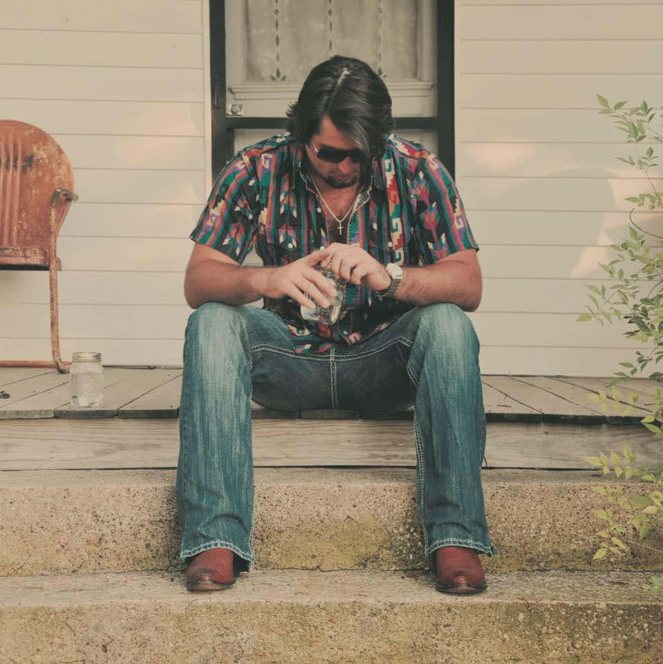 Koe Wetzel Sittingon Porch Steps Wallpaper