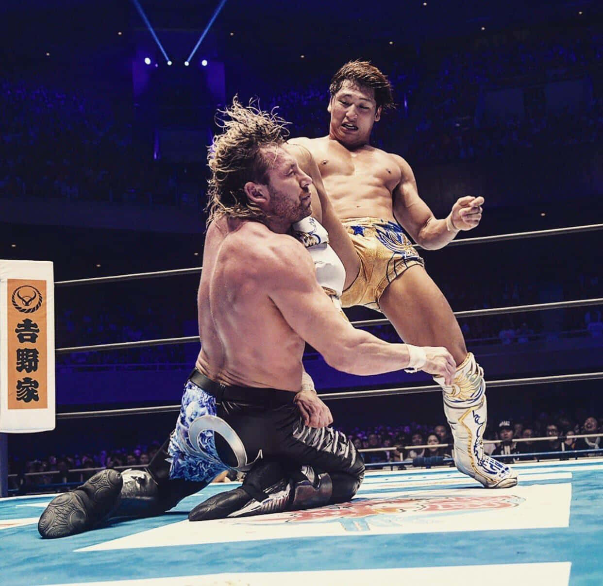 Kota Ibushi Kicking Kenny Omega Wallpaper