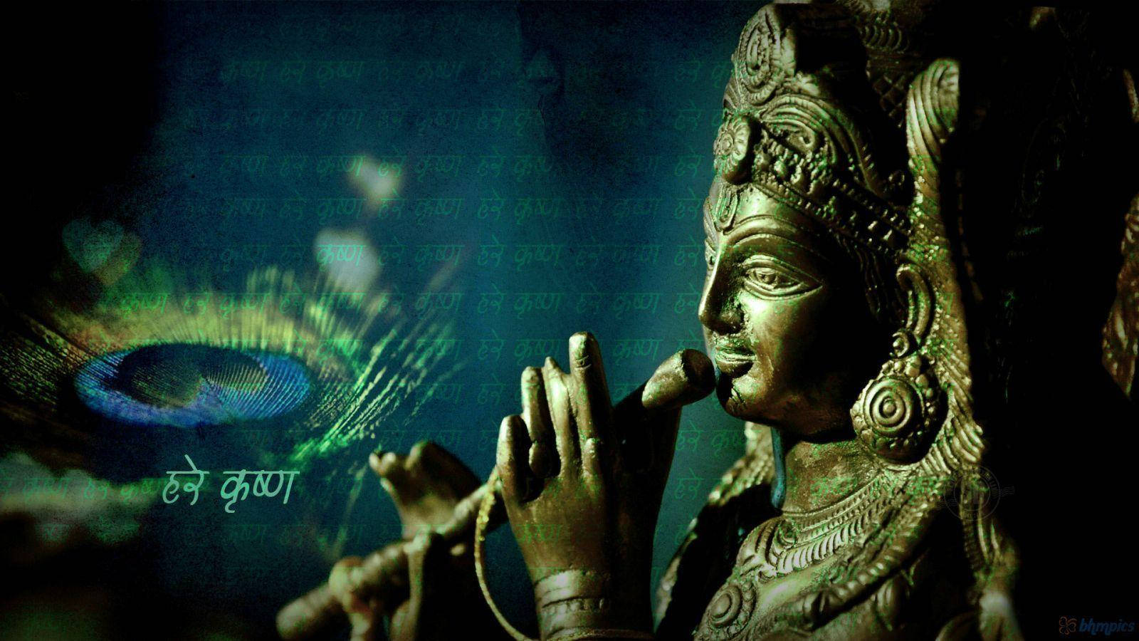 Krishna Bhagwan Gold Statue Under Green Lighting Wallpaper